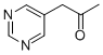 2-Propanone,1-(5-pyrimidinyl)-
